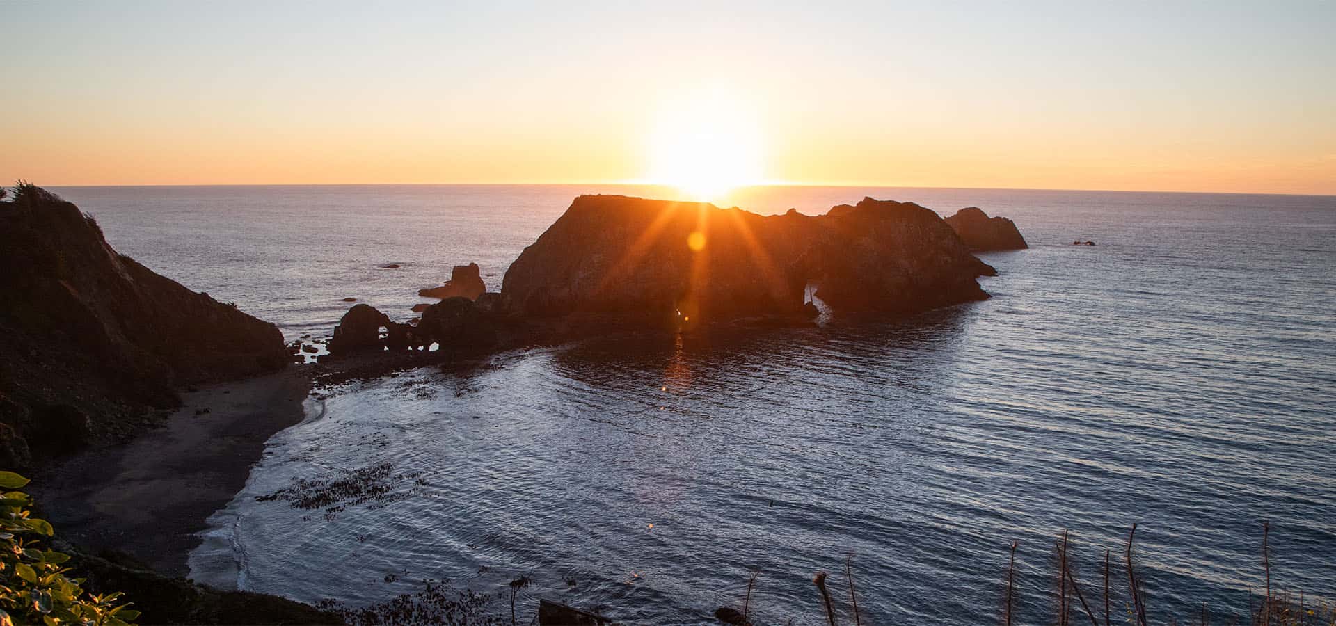 Sacred Rock Inn Rock and Ocean Sunset